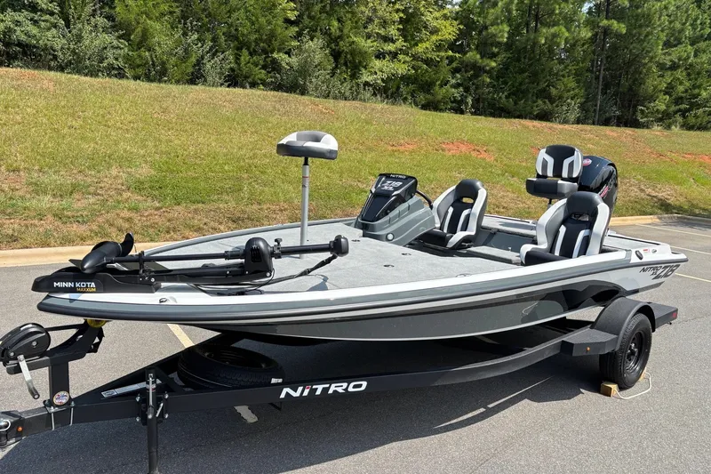 Slide: The Image of 2027 Nitro Z18 XL fishing boat with Minn Kota trolling motor on trailer. - 3