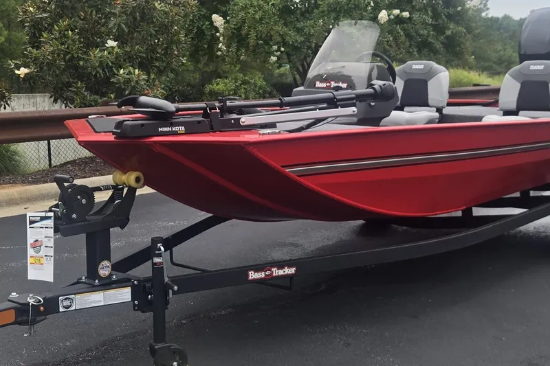 The Image of 2027 Tracker Bass Tracker Classic XL boat on trailer, featuring Minn Kota trolling motor. - 0