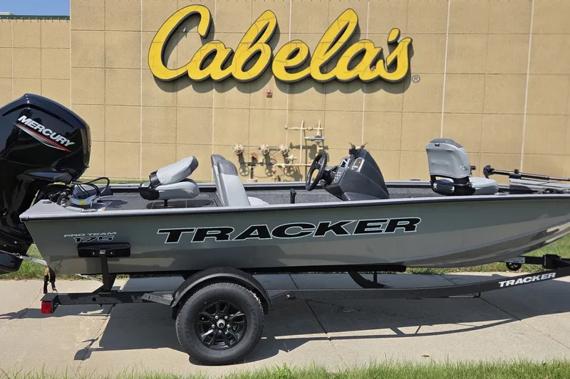 The Image of 2027 Tracker Pro Team 175 boat displayed outside Cabela's store. - 0