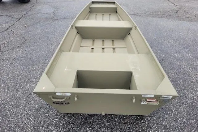 The Image of 2027 Tracker Grizzly 14 Jon boat on asphalt surface, showcasing interior layout. - 0
