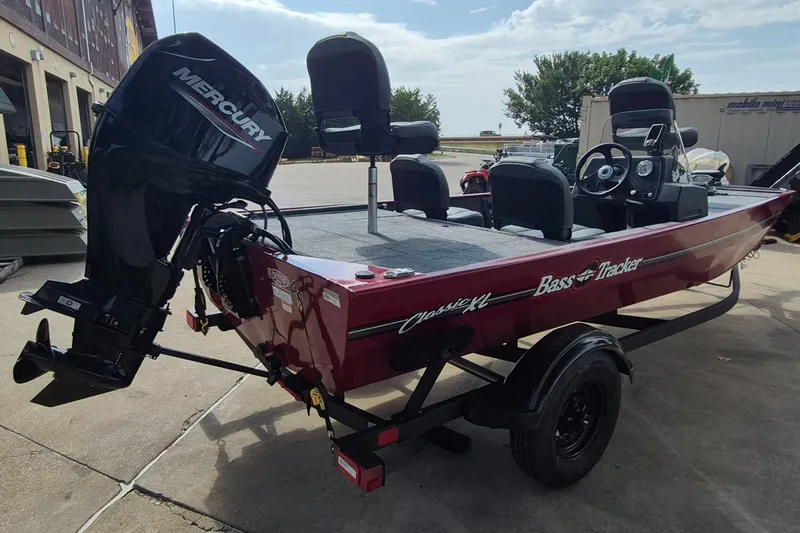 The Image of 2027 Tracker Bass Tracker Classic XL boat with Mercury engine on trailer. - 0