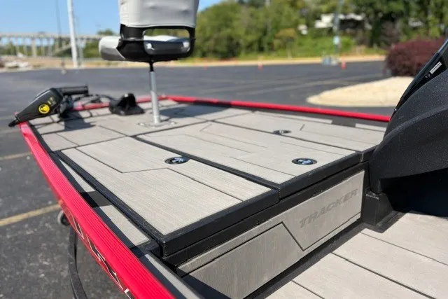 Slide: The Image of 2027 Tracker Pro 170 boat deck with seating and storage compartments. - 21