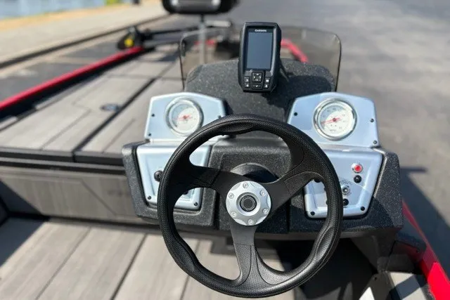 Slide: The Image of Steering console of 2027 Tracker Pro 170 boat with gauges and navigation system. - 16