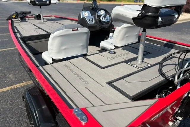 Slide: The Image of 2027 Tracker Pro 170 boat interior with seating and control panel. - 19
