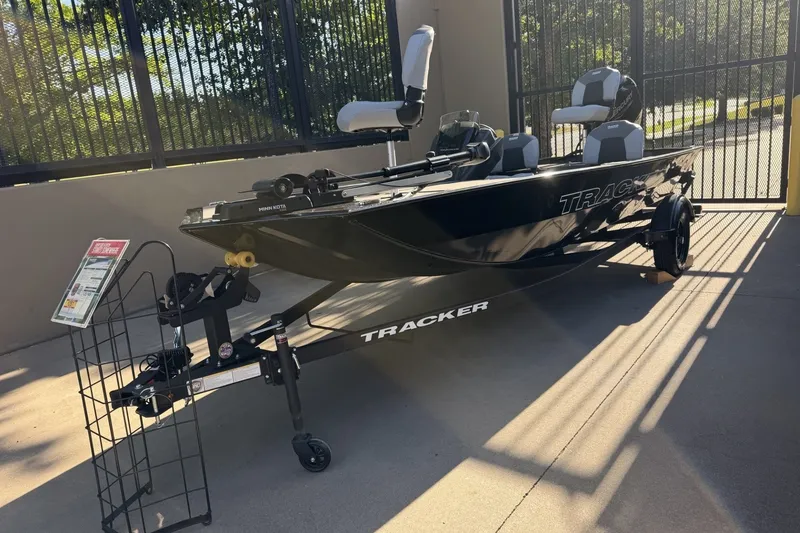 The Image of 2027 Tracker Pro 170 boat on trailer, displayed outdoors in sunlight. - 0