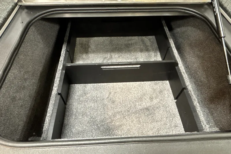 Slide: The Image of Open storage compartment in 2027 Tracker Pro Team 175 boat. - 20