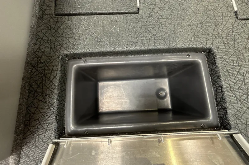 Slide: The Image of Storage compartment in 2027 Tracker Pro Team 175 boat interior. - 24