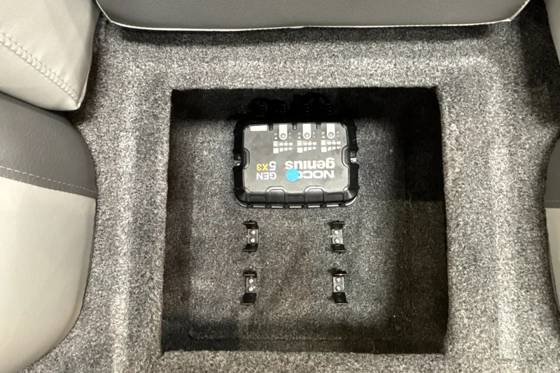 Slide: The Image of NOCO Genius GEN5X3 charger installed in 2027 Tracker Pro Team 175 boat compartment. - 18