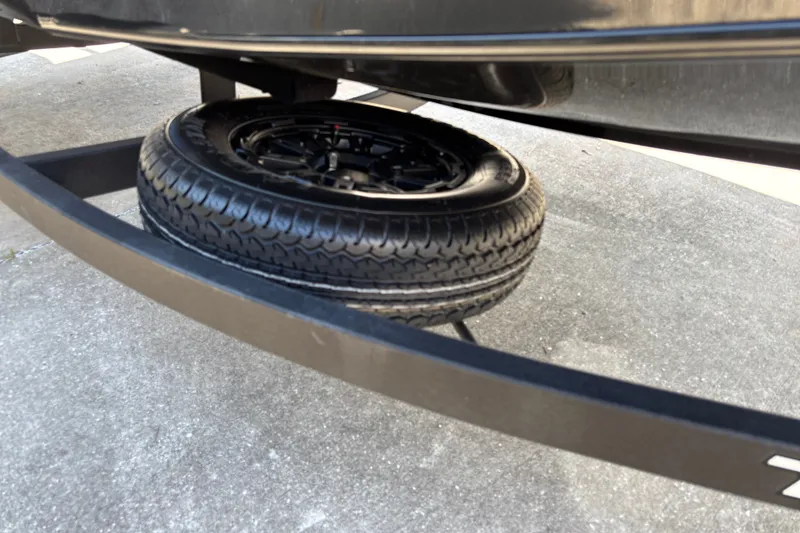 Slide: The Image of Spare tire mounted under 2027 Tracker Pro Team 175 boat trailer. - 27