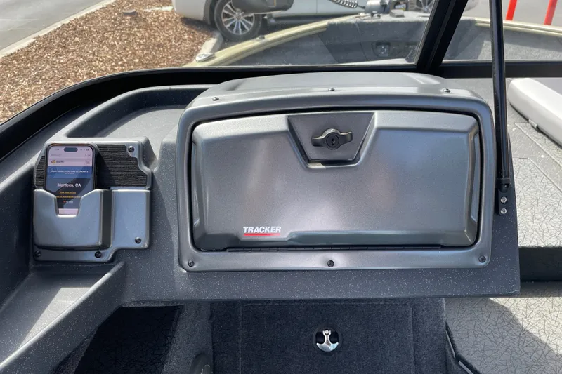 Slide: The Image of Dashboard of 2027 Tracker Pro Guide V-175 Combo boat with phone holder. - 17