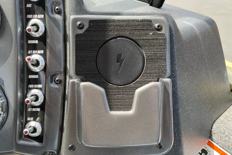 Slide: The Image of Control panel of 2027 Tracker Pro Guide V-175 Combo boat with switches and charging port. - 26