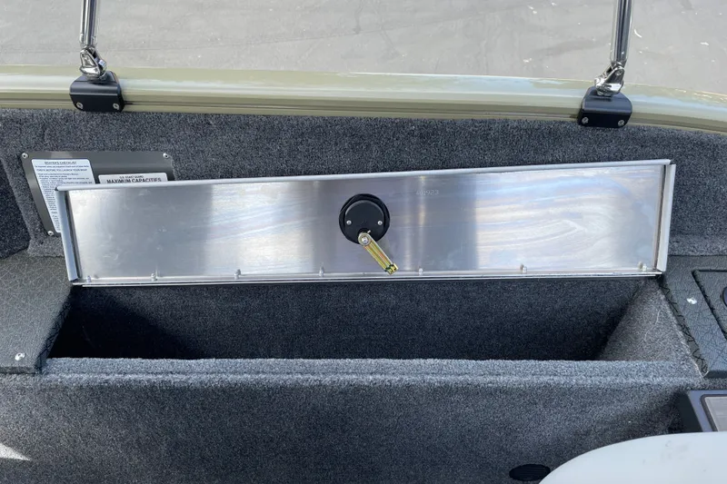 Slide: The Image of Interior view of 2027 Tracker Pro Guide V-175 Combo boat storage compartment. - 15