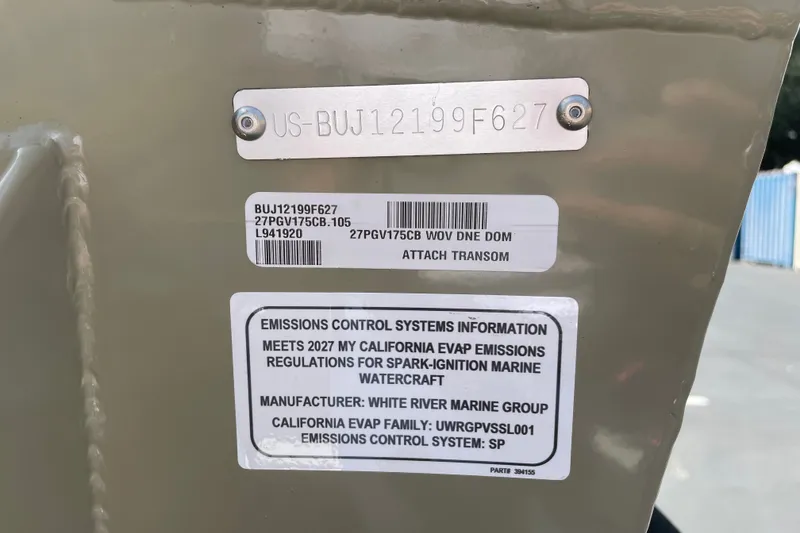 Slide: The Image of Emissions control information on 2027 Tracker Pro Guide V-175 Combo boat transom. - 76