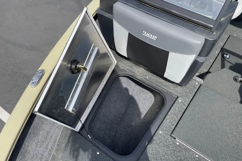 Slide: The Image of 2027 Tracker Pro Guide V-175 Combo boat interior with open storage compartment. - 30