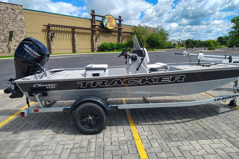 The Image of 2027 Tracker Bass Tracker Classic CC boat parked outside Bass Pro Shops. - 0