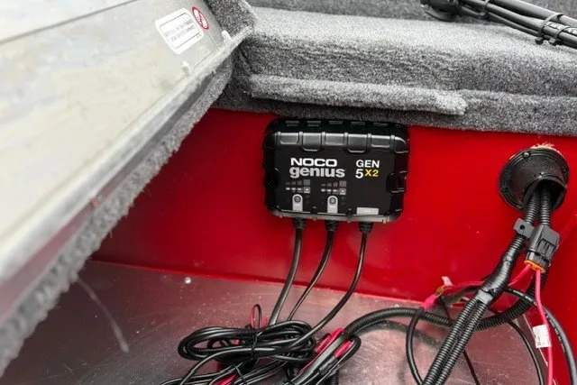 Slide: The Image of NOCO Genius GEN 5X2 charger installed in 2027 Tracker Super Guide V-16 SC boat. - 22