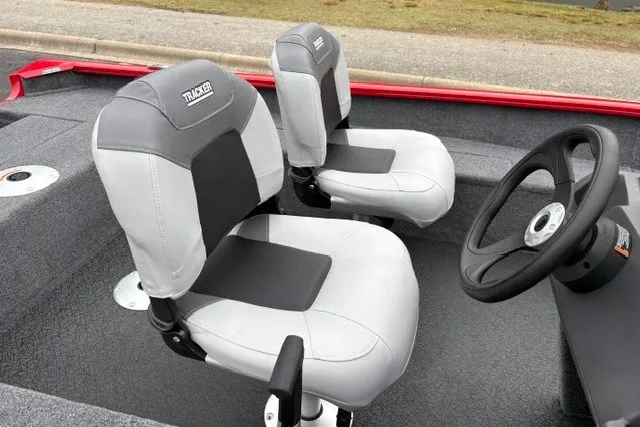 Slide: The Image of 2027 Tracker Super Guide V-16 SC boat seats, gray and black upholstery, modern design. - 17