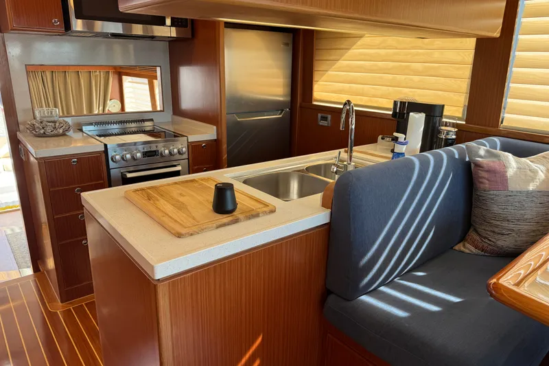 Slide: The Image of Luxurious kitchen interior of 2023 Apollonian Yachts 52 Pilothouse with modern appliances. - 15
