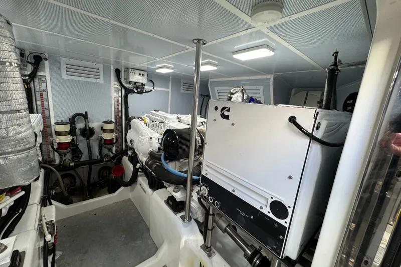 Slide: The Image of Engine room of 2023 Apollonian Yachts 52 Pilothouse, showcasing modern equipment and clean design. - 39