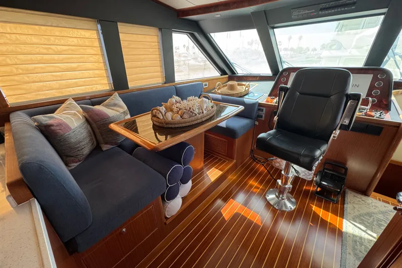 Slide: The Image of Luxurious interior of 2023 Apollonian Yachts 52 Pilothouse with plush seating and elegant decor. - 7