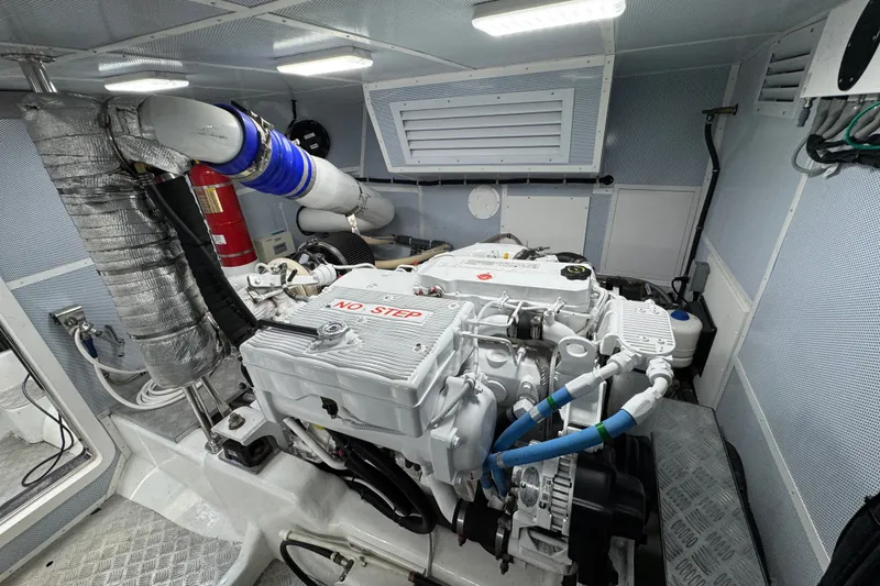 Slide: The Image of Engine room of 2023 Apollonian Yachts 52 Pilothouse, featuring advanced marine equipment. - 42