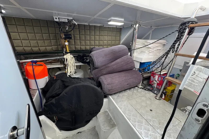 Slide: The Image of Interior storage area of 2023 Apollonian Yachts 52 Pilothouse with equipment and supplies. - 45