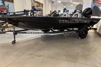 The Image of 2027 Tracker Pro Team 175 boat displayed indoors on a trailer. - 0
