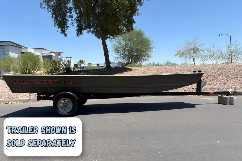The Image of 2027 Tracker Grizzly 15 Jon boat on trailer, outdoors, trailer sold separately. - 0