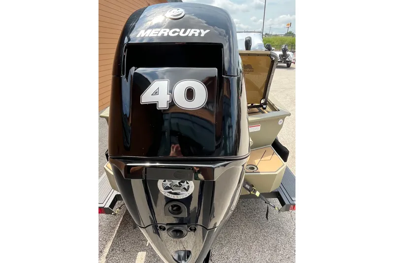 Slide: The Image of 2027 Tracker Grizzly 1553 Timber with Mercury 40 outboard motor, rear view. - 42