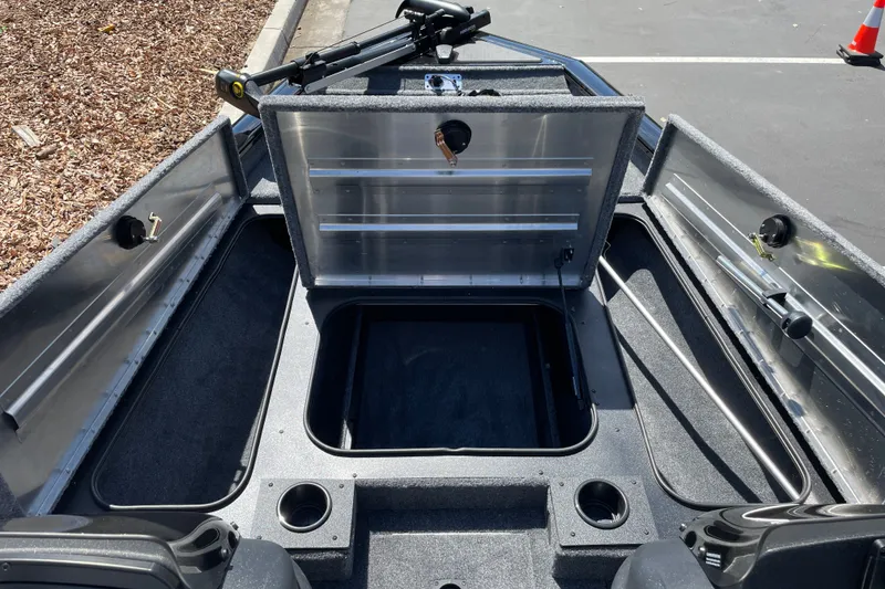 Slide: The Image of 2027 Tracker Pro Team 175 boat interior with open storage compartments. - 17