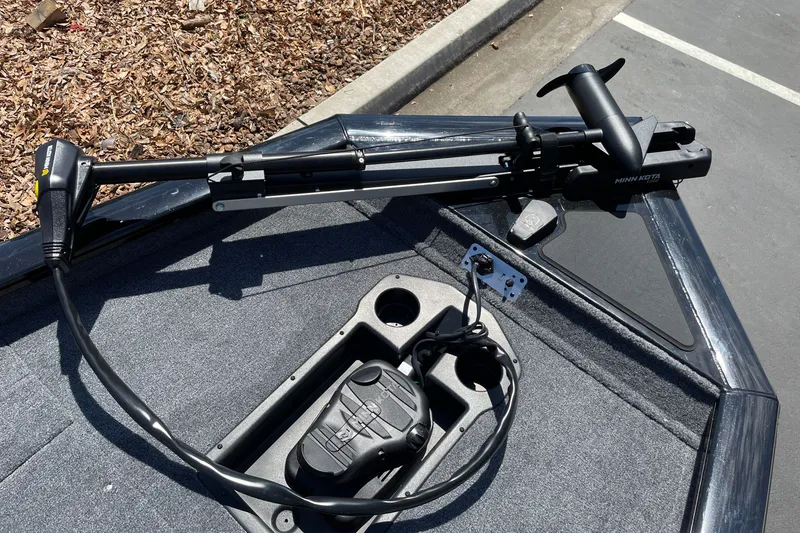 Slide: The Image of 2027 Tracker Pro Team 175 boat with Minn Kota trolling motor on deck. - 21