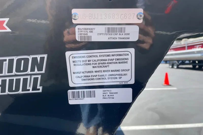 Slide: The Image of 2027 Tracker Pro Team 175 boat emissions control label with California compliance details. - 58