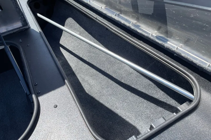 Slide: The Image of Storage compartment of 2027 Tracker Pro Team 175 boat, featuring sleek interior design. - 20