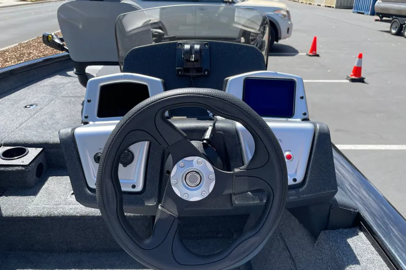 Slide: The Image of Steering console of 2027 Tracker Pro Team 175 boat with dual displays. - 14