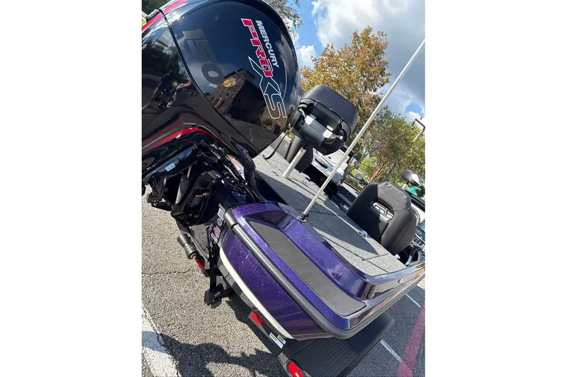 Slide: The Image of 2027 Nitro Z18 XL Pro boat with Mercury Pro XS engine in parking lot. - 10
