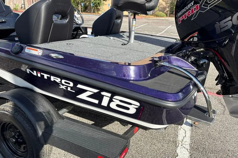 Slide: The Image of 2027 Nitro Z18 XL Pro boat with Mercury Pro XS engine in parking lot. - 9