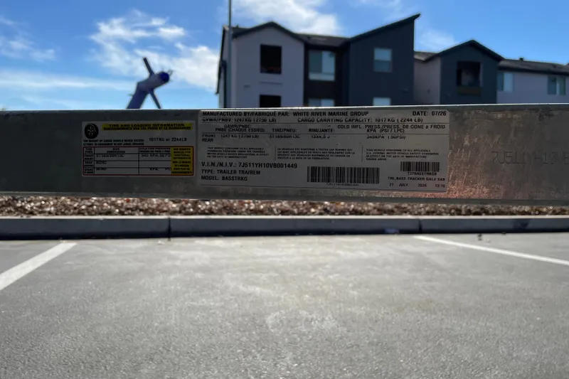Slide: The Image of Trailer label for 2027 Tracker Bass Tracker Classic CC, showing specifications and VIN details. - 55