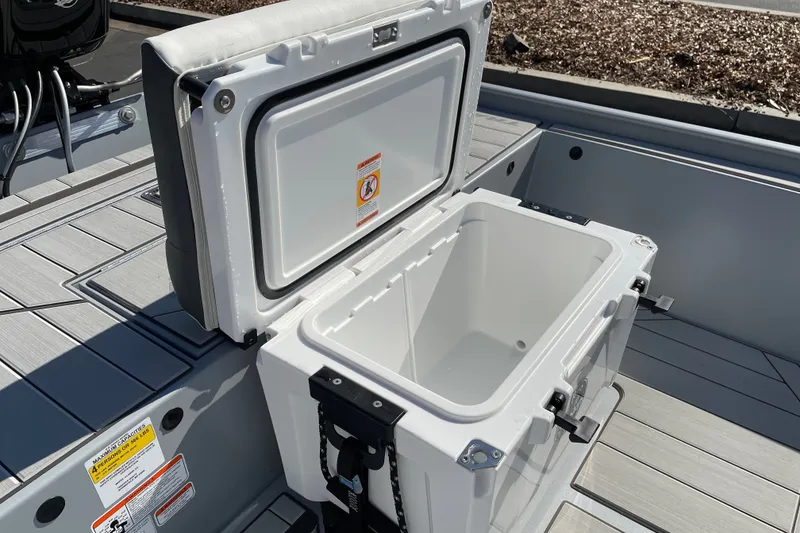 Slide: The Image of 2027 Tracker Bass Tracker Classic CC boat with open storage compartment on deck. - 13