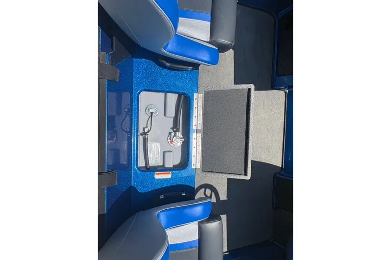 Slide: The Image of Interior view of a 2027 Nitro Z18 XL boat, featuring blue seating and storage compartments. - 72