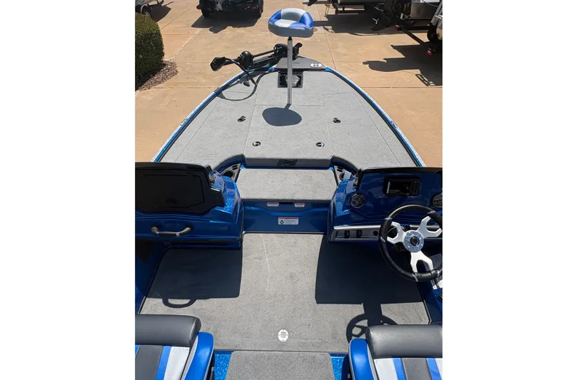 Slide: The Image of 2027 Nitro Z18 XL boat interior with steering wheel and seating. - 6