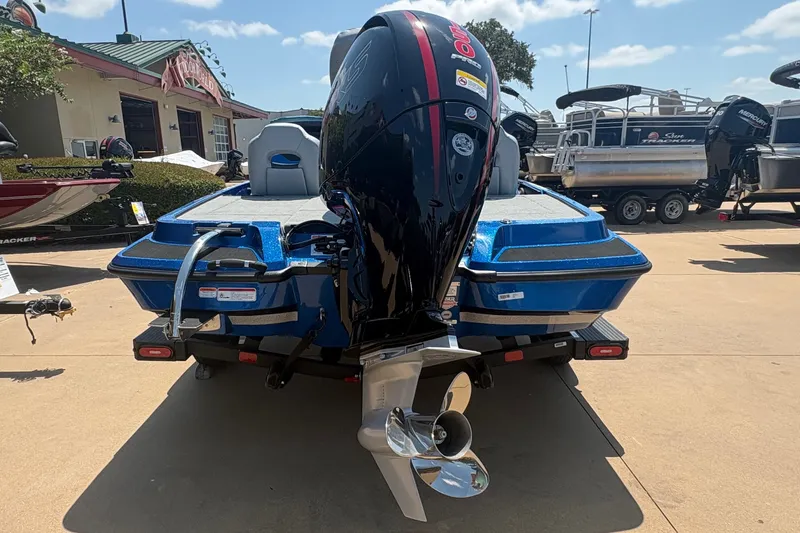 Slide: The Image of 2027 Nitro Z18 XL boat with powerful outboard motor, displayed outdoors. - 4