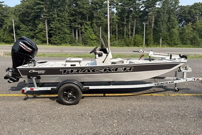The Image of 2027 Tracker Bass Tracker Classic CC boat on trailer, parked roadside. - 0