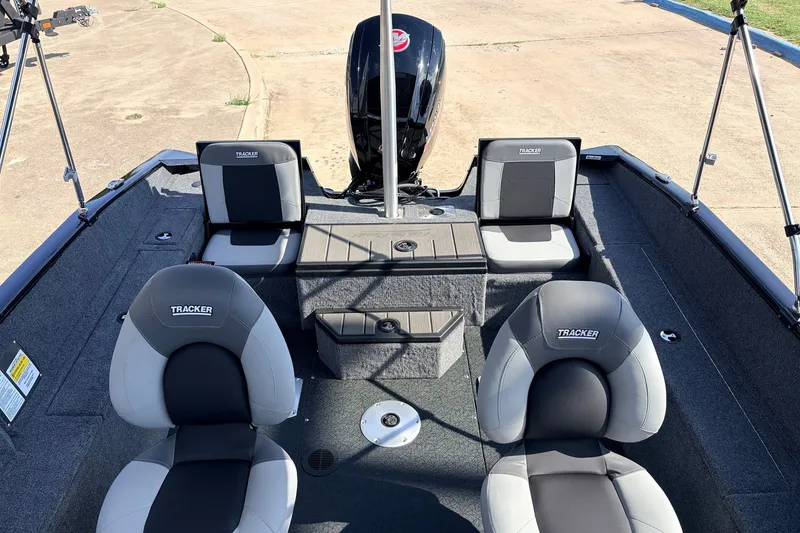 Slide: The Image of 2027 Tracker Pro Guide V-175 Combo boat interior with seating and storage compartments. - 33