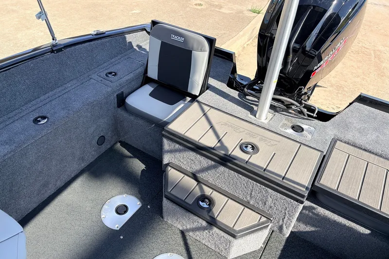 Slide: The Image of Interior of 2027 Tracker Pro Guide V-175 Combo boat with seating and storage compartments. - 39