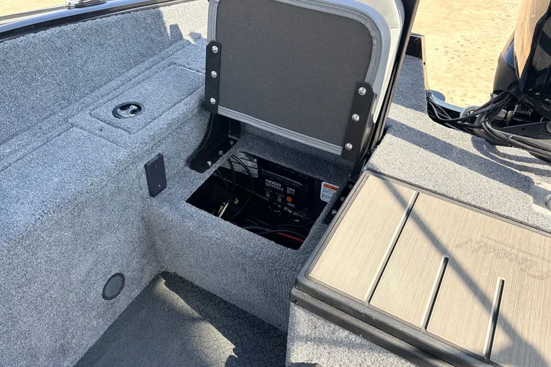 Slide: The Image of Interior view of 2027 Tracker Pro Guide V-175 Combo boat, showcasing storage compartment. - 41