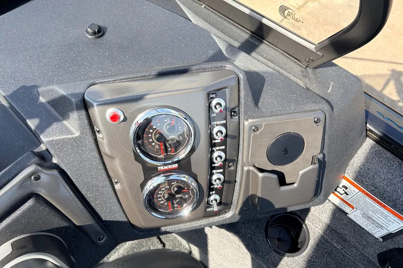 Slide: The Image of 2027 Tracker Pro Guide V-175 Combo dashboard with gauges and controls. - 30