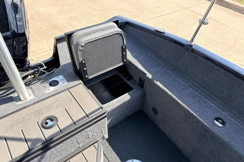 Slide: The Image of 2027 Tracker Pro Guide V-175 Combo boat interior with storage compartment open. - 36