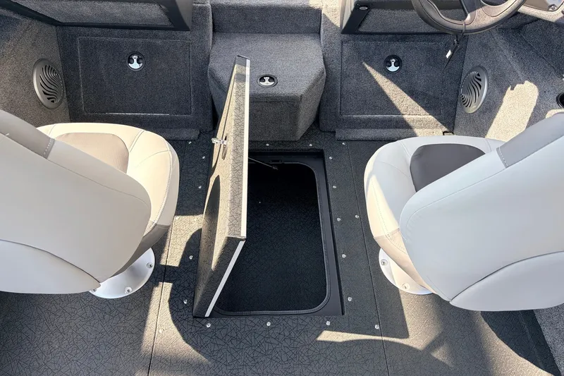 Slide: The Image of 2027 Tracker Pro Guide V-175 Combo boat interior with storage compartment open. - 22