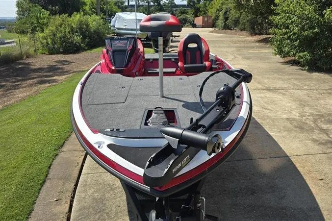 Slide: The Image of 2027 Nitro Z18 XL boat with trolling motor on a driveway. - 6
