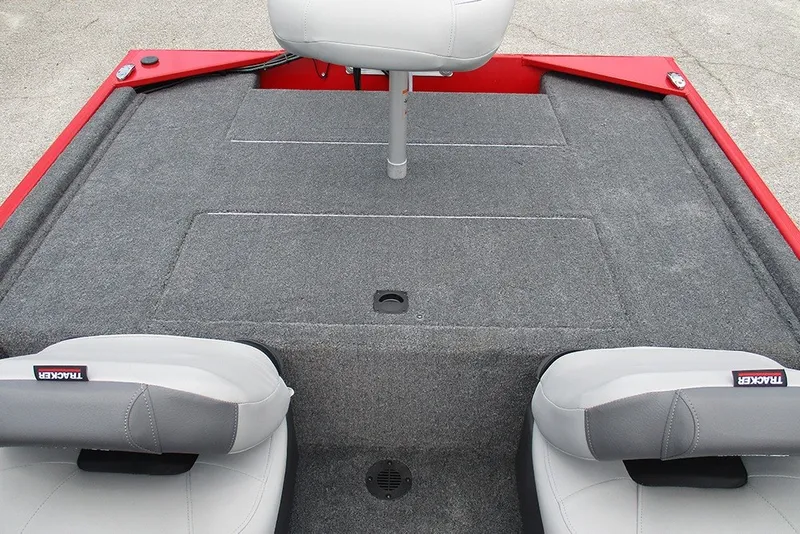 Slide: The Image of 2027 Tracker Bass Tracker Classic XL boat interior with gray carpet and seating. - 18